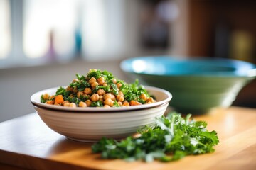 bright light on bowl of roasted chickpeas with parsley