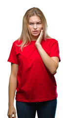 Fototapeta premium Young caucasian woman over isolated background touching mouth with hand with painful expression because of toothache or dental illness on teeth. Dentist concept.