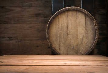 background of barrel and worn old table of wood. High quality photo. High quality photo