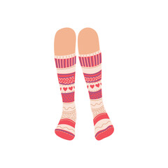 Legs in pair of long patterned socks.