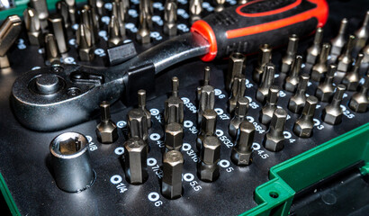 Naklejka premium Screwdrivers for repair. Set of screwdriver bits. Metal bits for screwdrivers. Tool kit Bits and adapters for screwdrivers.