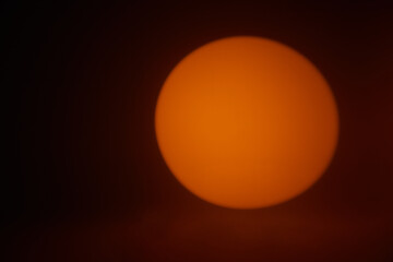 Dark orange spot light on white background, abstract geometric background.