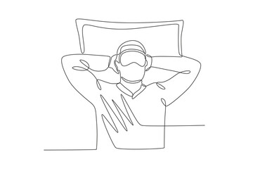 A man sleeps with a blindfold