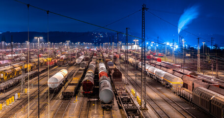 Panoramic view of large shunting yard and freight station in Hagen Germany on a cold winters night....