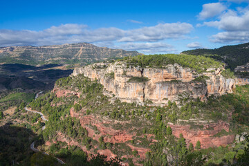 Fototapeta na wymiar View of cliffs of the Gritella mountain range, near Siurana in Spain, horizontal
