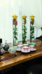 still life with candle and flowers