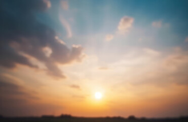 Sky blue and orange light of the sun through the clouds in the sky survive