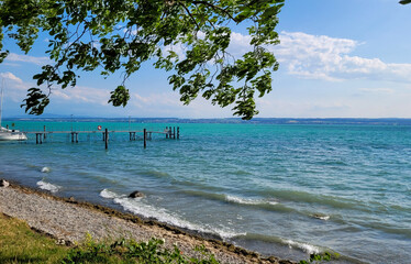 Beautiful alpine Lake Constance with clean transparent water in a sunny summer day