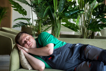 Rest after lunch Siesta in European countries worker sleeps on sofa during the day. - obrazy, fototapety, plakaty