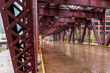 Street over a double deck bridge in Chicago downtown on a rainy spring day