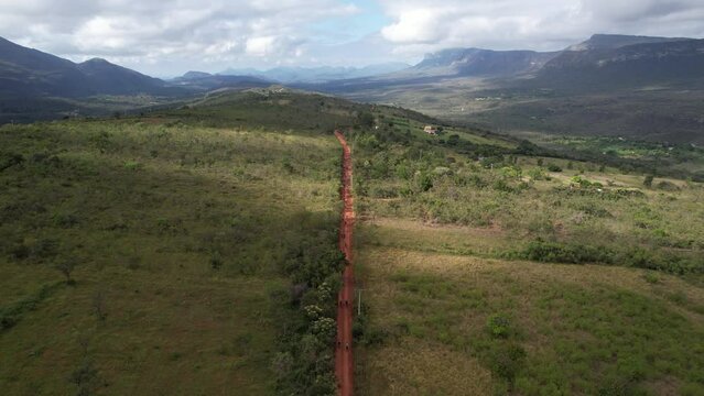 Cyclists in competition with mountains and lots of nature around in Piat&atilde;, Bahia. Chapada Diamantina.