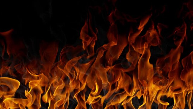 Super Slow Motion Shot of Real Fire Background Isolated on Black at 1000fps.