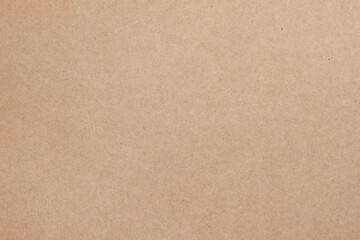 Texture of old organic cardboard, beige paper, background for design. Recyclable material