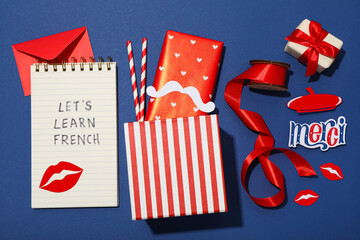 Notepad with the message of learning the French language. © Atlas