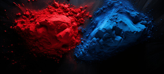 bright red and blue Holi powder against black surface