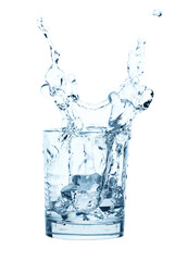 Falling Ice Cubes into the Glass of Water with splash, isolated on white background 