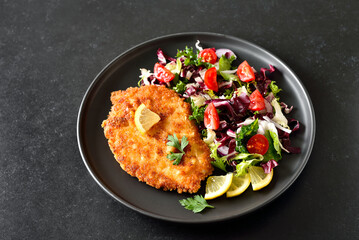 Chicken schnitzel and vegetable salad