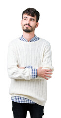 Young handsome man wearing winter sweater over isolated background smiling looking side and staring away thinking.