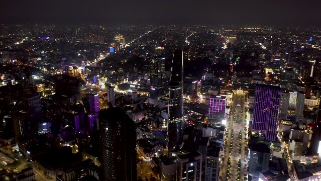 4k Aerial Drone Footage - Skyline of Saigon, Vietnam at Night.
