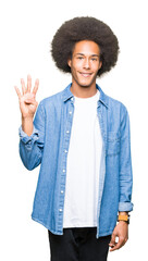 Young african american man with afro hair showing and pointing up with fingers number four while smiling confident and happy.