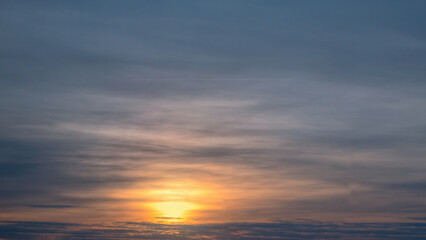 Obraz premium Sunset Sky, Morning Sunrise with colorful Yellow, Orange Sunrise on blue white Cloud, Golden hour Romantic Summer Sky Background.