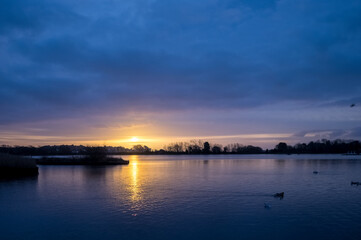 Beautiful sunrise on Poole Park lake