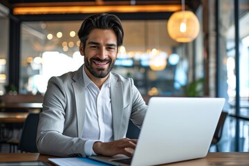 Fototapeta premium Happy young Latin business man looking at laptop at work. Smiling businessman professional executive manager investor using computer sitting in office, Generative AI