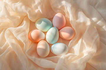 Pastel easter eggs in a white  piece of cloth, beautiful sunlight  - obrazy, fototapety, plakaty
