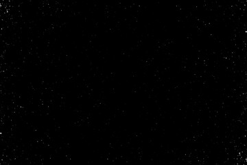 nature background image of light snowfall falling over of snowdrifts. Festive falling snow flakes. Snowstorm dust frozen elements. Snowfall sky white blue. Bokeh snowflakes january. Snow landscape