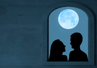 full moon above silhouette of couple kissing embracing together. .view on a facade of white ancient building. mockup. isolated on white background. one arched windows. mock up. arch window.