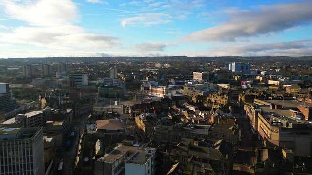Aerial footage flying over Bradford City Centre towards City Hall 