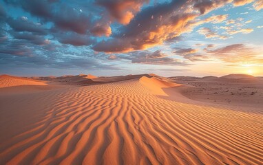 Sand dunes at sunset in the Wahiba Sands desert with clouds in the sky, , Middle East