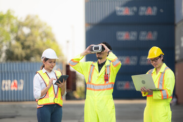 Engineers and laborers utilize VR headsets to control work in a container warehouse.
