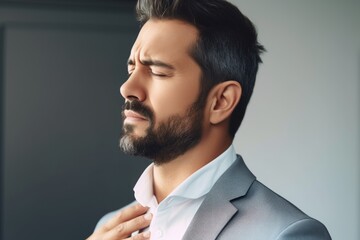cropped shot of a businessman experiencing neck pain