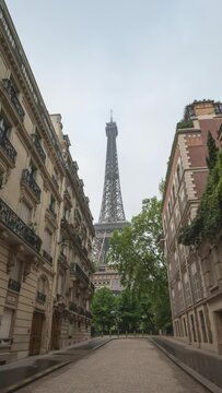 Paris France time lapse, vertical city skyline timelapse at Eiffel Tower with street and architecture building in Paris