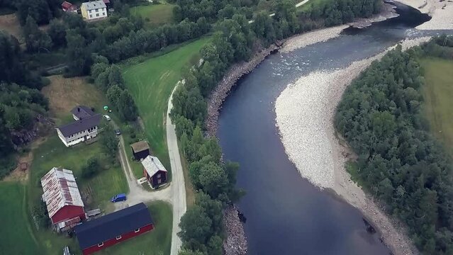 Drone footage over river in nature with beautiful landscape.  Gaula River, Norway