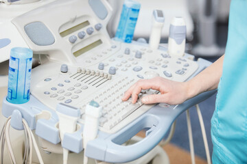 Modern medical equipment in the clinic. An ultrasound machine. Elastography and sonography. Doctor...