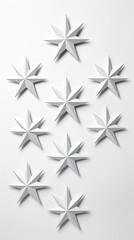 Obraz premium White star shapes, on a light gray background created with Generative Ai