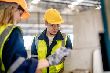 worker carpenters working in machines to cut wood timber. man and woman are crafting with wood in a workshop. two craftsmen or handymen working with carpenter tools or electric machines.
