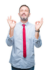 Middle age hoary senior business man wearing red tie over isolated background relax and smiling with eyes closed doing meditation gesture with fingers. Yoga concept.