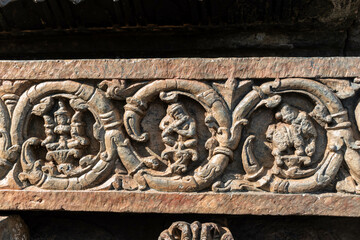 Beautiful intricate patterns and carvings of figurines on the wall of the ancient Chennakeshava...