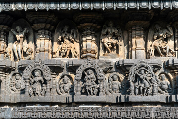 Beautiful intricate patterns and carvings of figurines on the wall of the ancient Chennakeshava...
