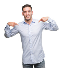 Handsome young businessman looking confident with smile on face, pointing oneself with fingers...
