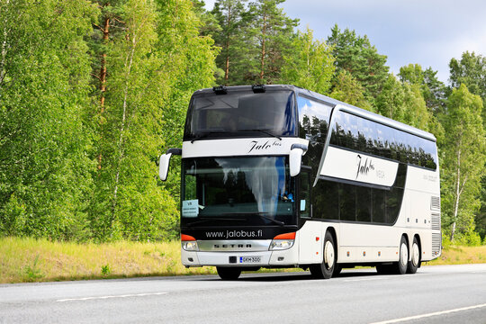 White Two-Storey Setra S431DT Bus on Road