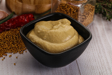 Dijon mustard sauce in the bowl