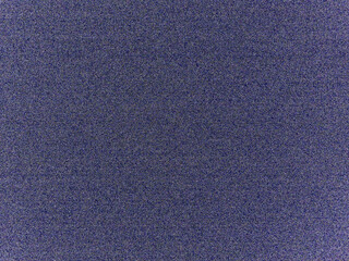 Colored noise, blue textured background. Denim cotton fabric.