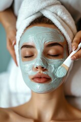 Gently applying beauty treatment mask for skin