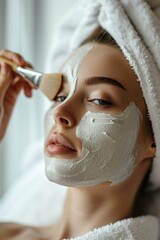 Gently applying beauty treatment mask for skin