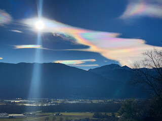 rainbow over the swiss mountains