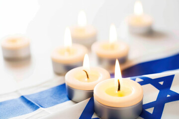 Hanukkah Holiday celebration banner with burning candles 